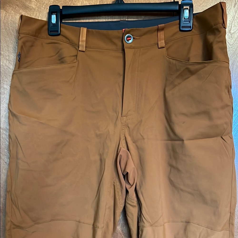 The North Face pants 34x32. Burnt orange color